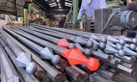 replication forging of decorative railheads on bar for birmingham jewellery quarter