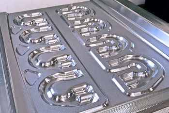 in-house tooling production for rapid production of near net shapes