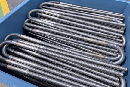The warm formed u-bolts in 708M40 EN9 material prior to galvanising process