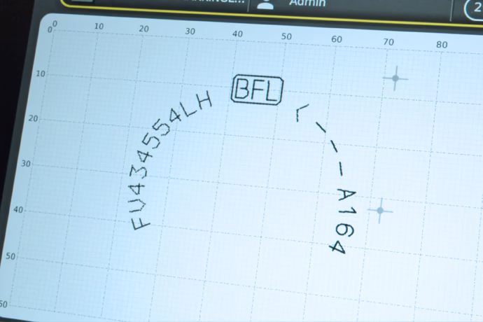 Digitally controlled micro-percussion marking system.