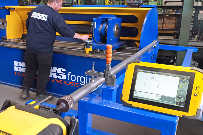 A dedicated micro-percussion marking system is located next to the new torsion bar pre-setting and scragging machine at Brooks Forgings